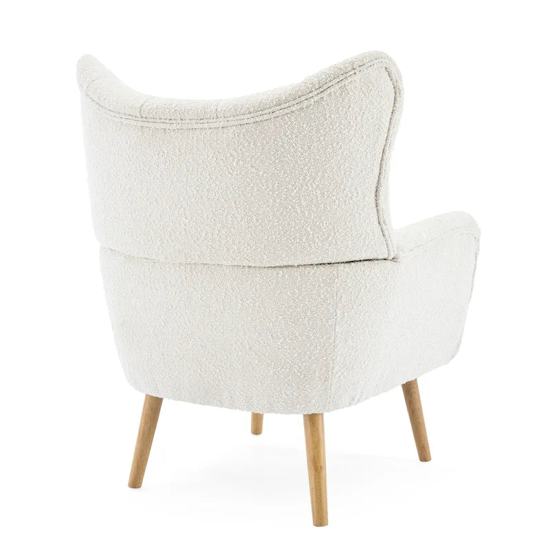 Fauteuil club capitonné Almond Boucle Wingback