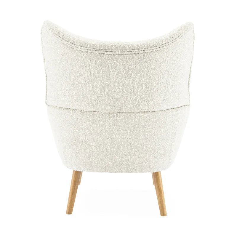 Fauteuil club capitonné Almond Boucle Wingback